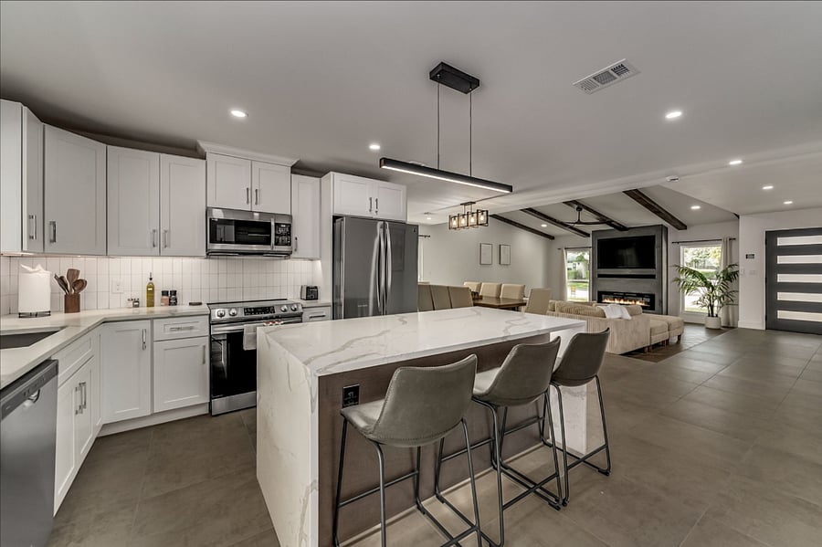Full size kitchen with a 6-foot island with seating