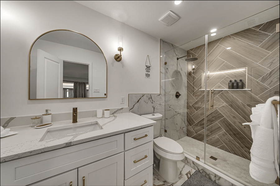 Brand New Master Suite with a walk-in shower and large vanity.
