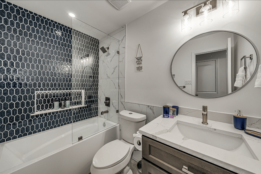 Brand New Guest Bathroom with a large tub.