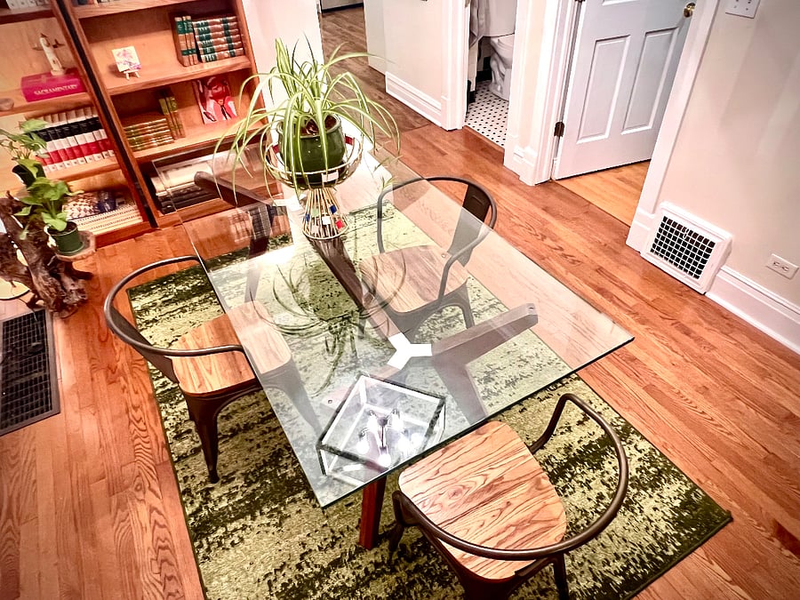 dining table from above; a perfect table for dining but also is a very handy workspace if the dedicated workspace in the Chicago room gets monotonous