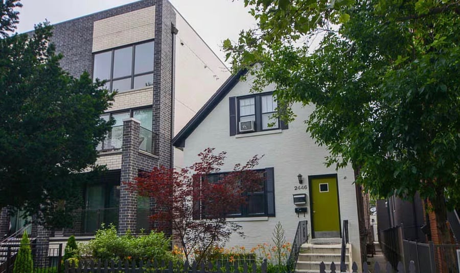This is the front view of 2446 W Thomas! Welcome to your new home for a season. In front of the picket fence next to the street itself is a lovely walkway typical of Ukrainian Village and Chicago neighborhoods. Throughout the summer and autumn, neighbors are walking their dogs, pushing strollers and generally enjoying what has become a long (for Chicago) summer/autumn...now lasting well into October and often, into November. The house is an old-style home with a courtyard behind it of brick that separates the main house from the coach house - a relic of Chicago's architectural history from the early 20th century. We have a tenant that lives in the upstairs unit of the home and a tenant that lives in the coach house as well. It is a quiet, residential neighborhood tucked away but close enough to the hustle and bustle of the city.