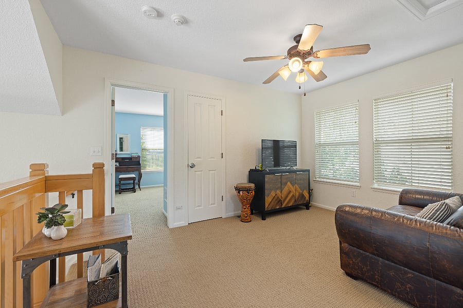 Third floor living space with two bedrooms and a bath on this floor.