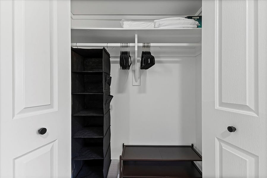 Each bedroom closet has hangers, hanging organizer, luggage rack and laundry basket as well as additional pillows and linens.