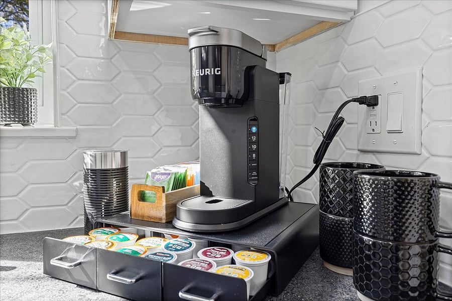 Kitchen amenities include a Keurig with coffee pods to get started, a tea pot and selection of teas, blender, instant pot, and more!