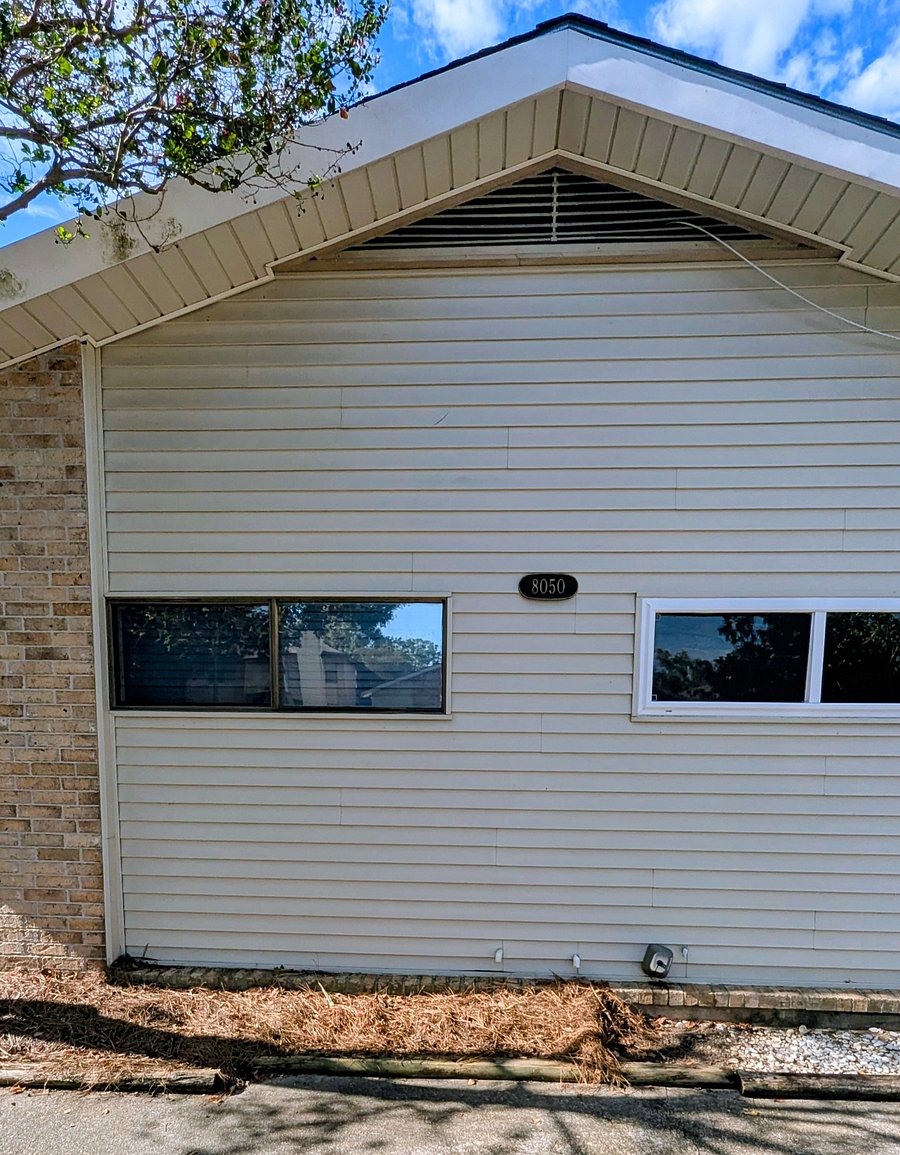Unit A bedroom # 1 window is to the left