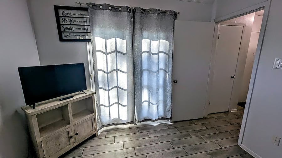 BDRM # 1-room entry & french doors to private patio area