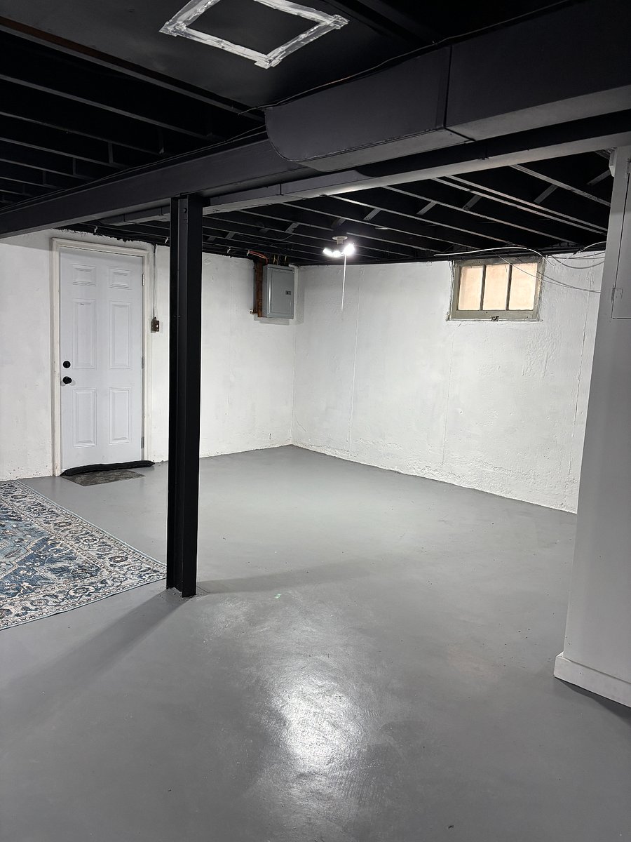 Large, dry basement with storage and walk out to backyard