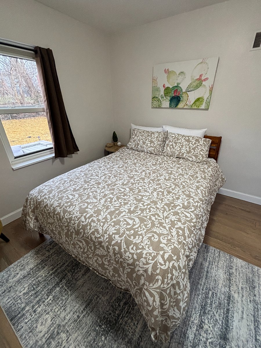 Bedroom with comfy queen mattress and two sets of extra linens