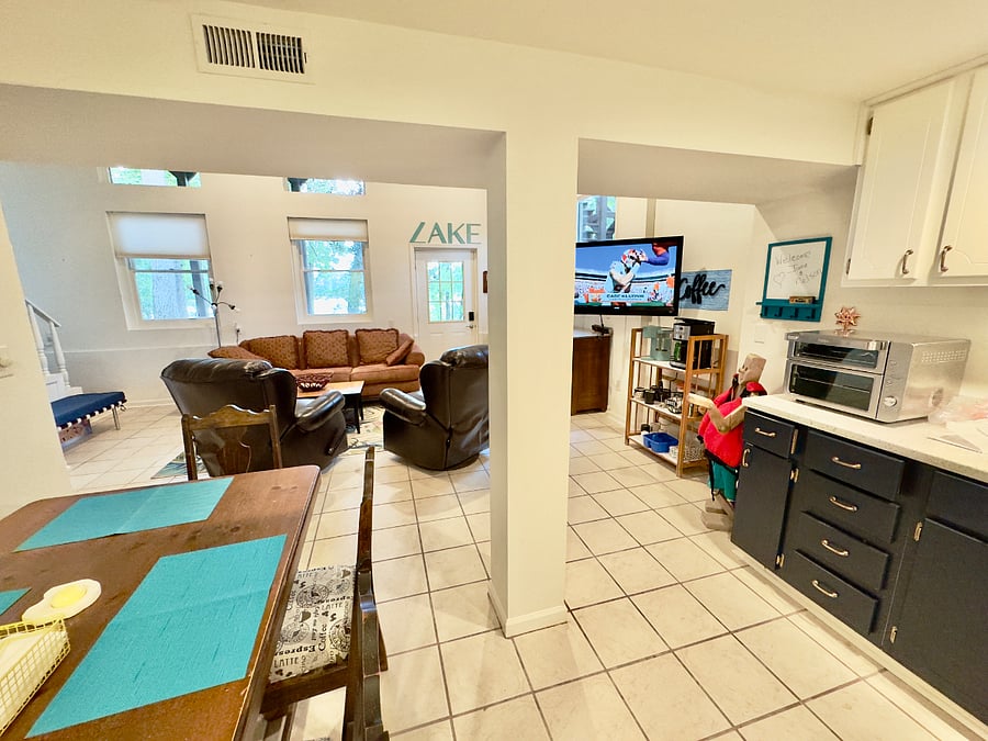 Kitchen opens into living room 