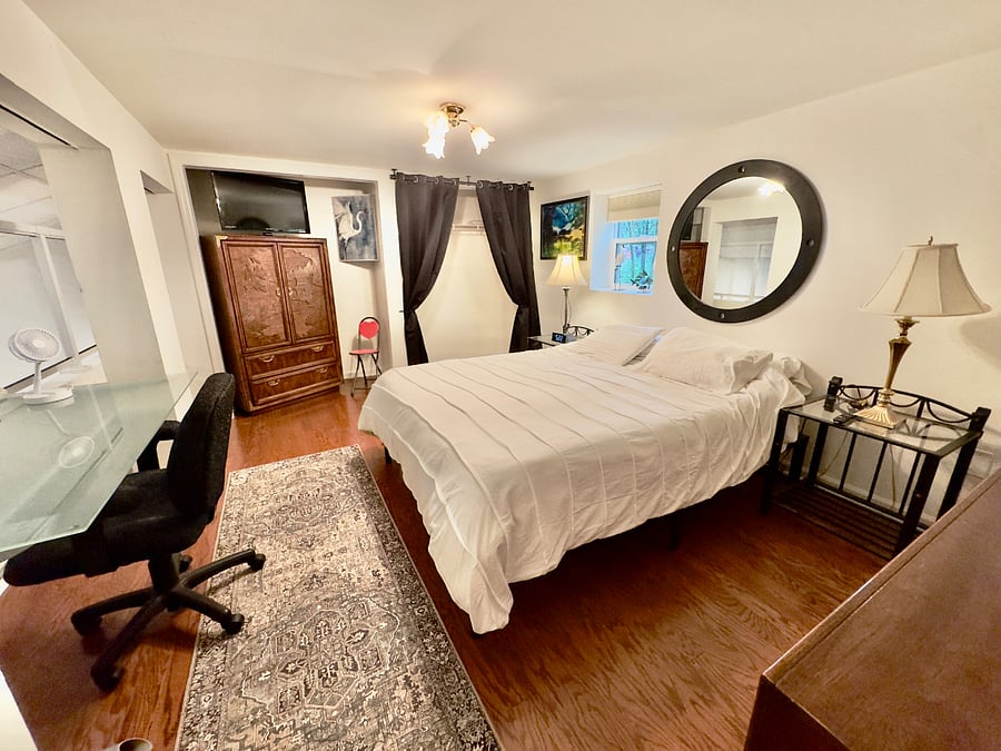Queen size bed, Art-Inlaid Chinese dressers, TV, window, office chair, portable fan, work desk...low doorway to enter