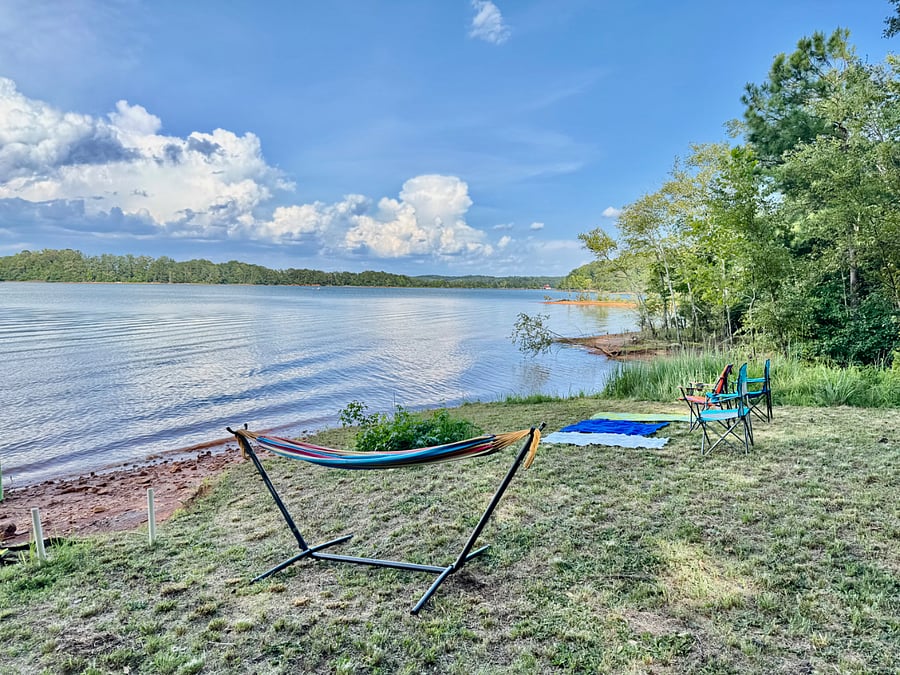Wide view of lake from chairs, towels or hammock 
