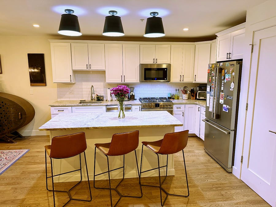 Bright cheery kitchen with stainless steel appliances (gas range + oven, full-size dishwasher, refrigerator, coffee pot + grinder, air fryer oven + some additional appliances in the kitchen closet.  The kitchen is very well stocked, and optionally, I can leave the spice cabinet stocked for you (we have a TON of spices, mostly penzeys)