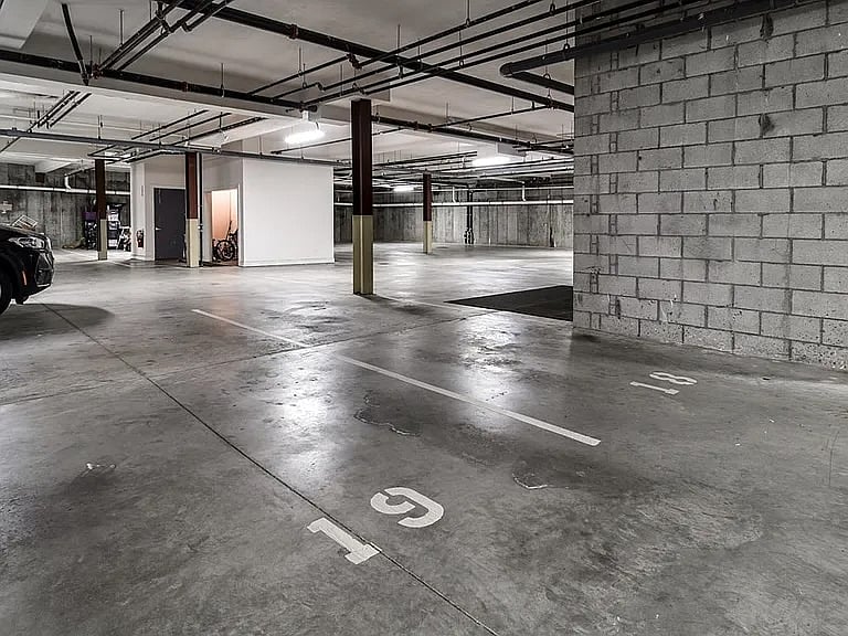 There is one garage space included, serviced by an elevator.