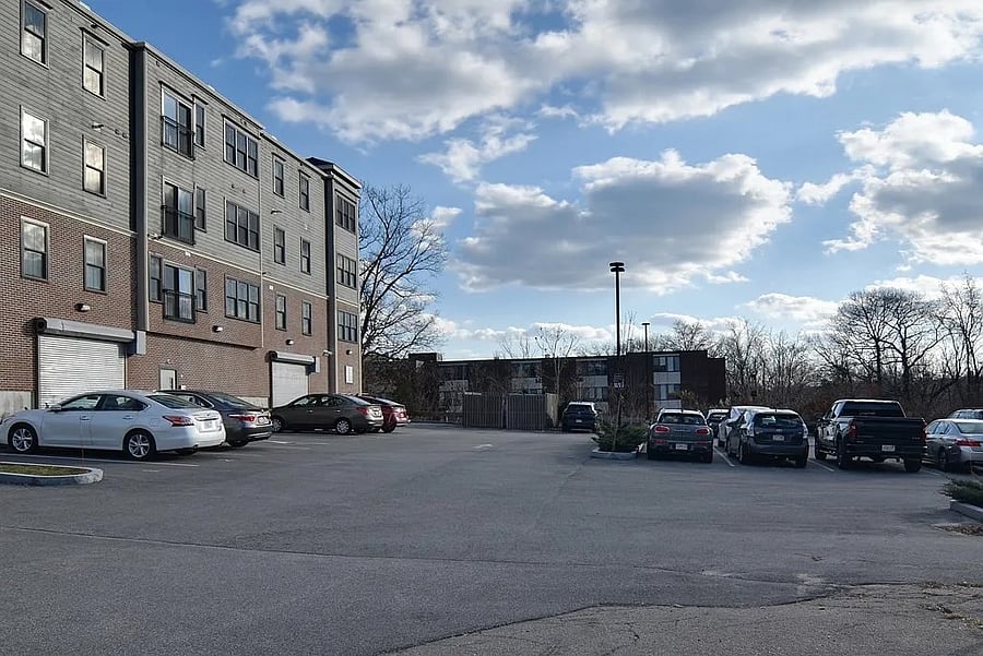 There is one reserved outdoor parking spot included.  There are also ~5 or 6 guest spots.  Parking is never an issue in this neighborhood -- there is also ample street parking.