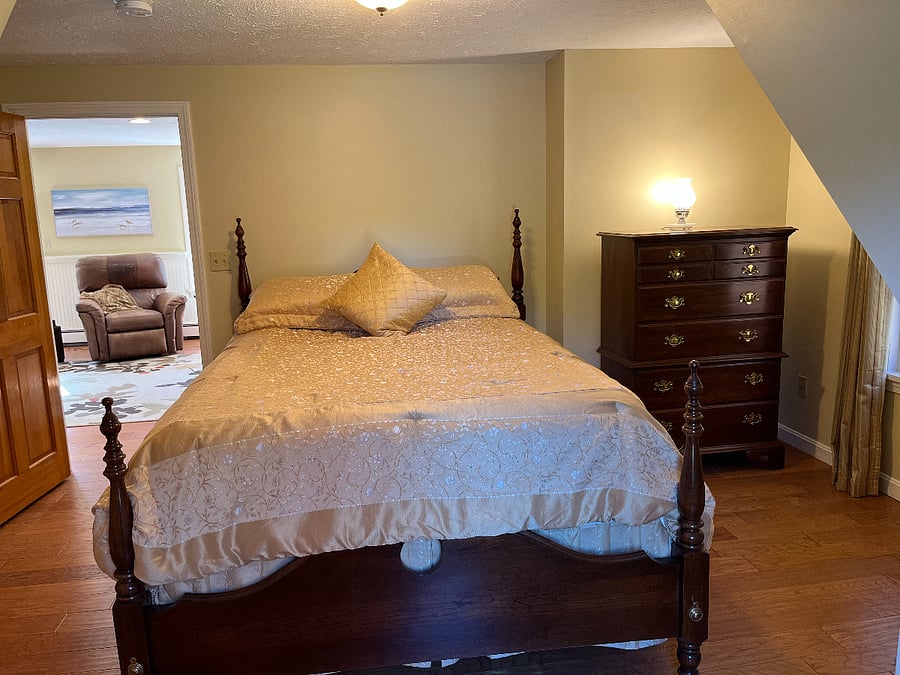 Bedroom 1- Queen bed and dresser