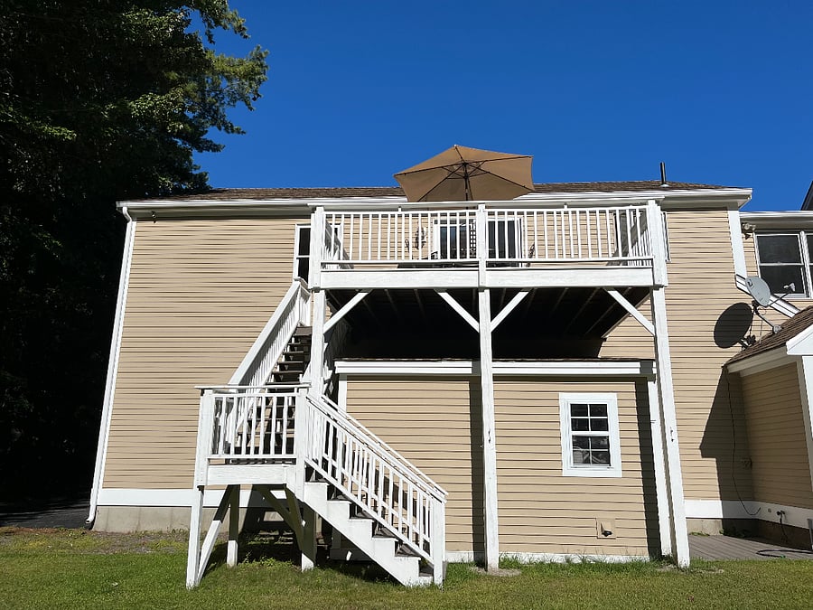 Private deck and secondary egress. 