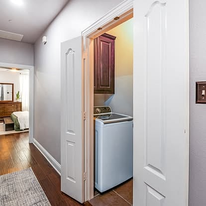 Bedrooms and fully stocked laundry room on second floor