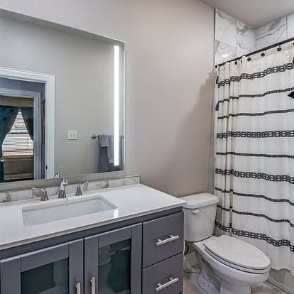 Guest bathroom with shower and tub