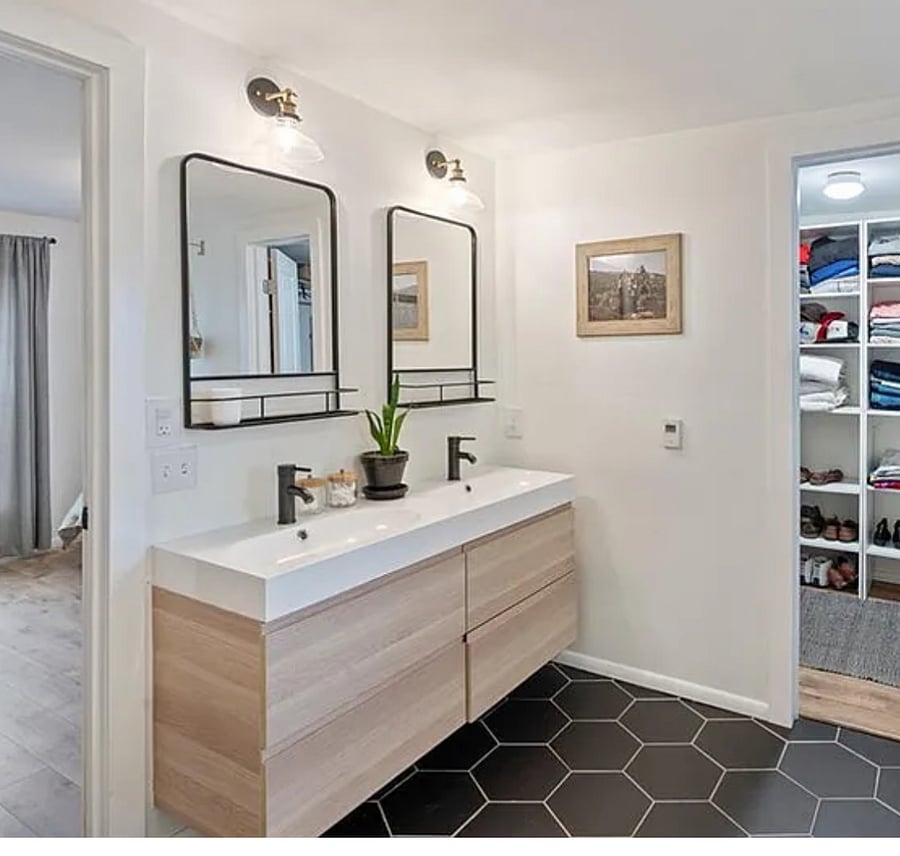 The en-suite master bathroom features heated floors, with adjustable settings, and a walk-in closet.
