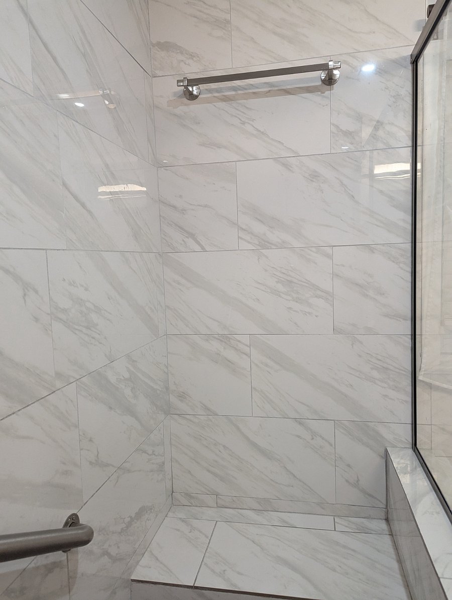 Sit comfortably in your walk-in shower while decompressing from your long day.