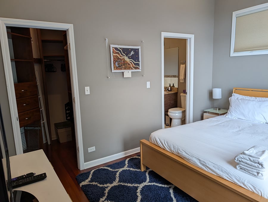 Primary bedroom with en suite bath and walk in closet