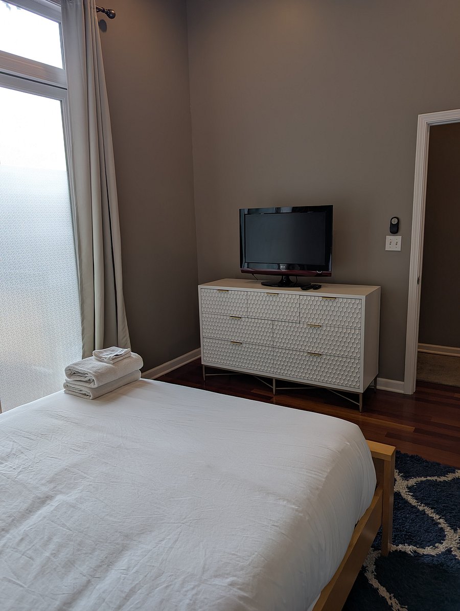 Primary bedroom with Roku tv