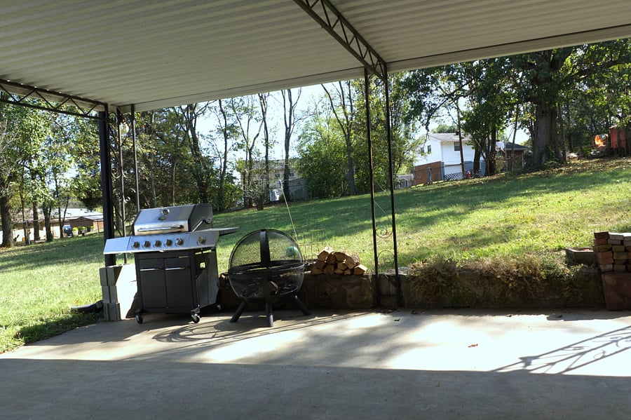 Propane grill, portable fire pit, massive fenced in back yard.