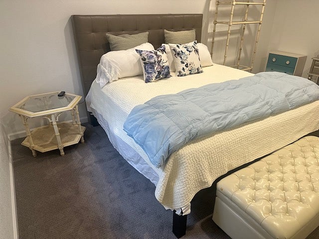 Large bedroom with comfortable king size bed.