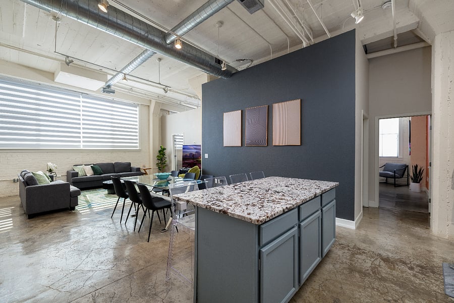 Kitchen, dining, and living space.