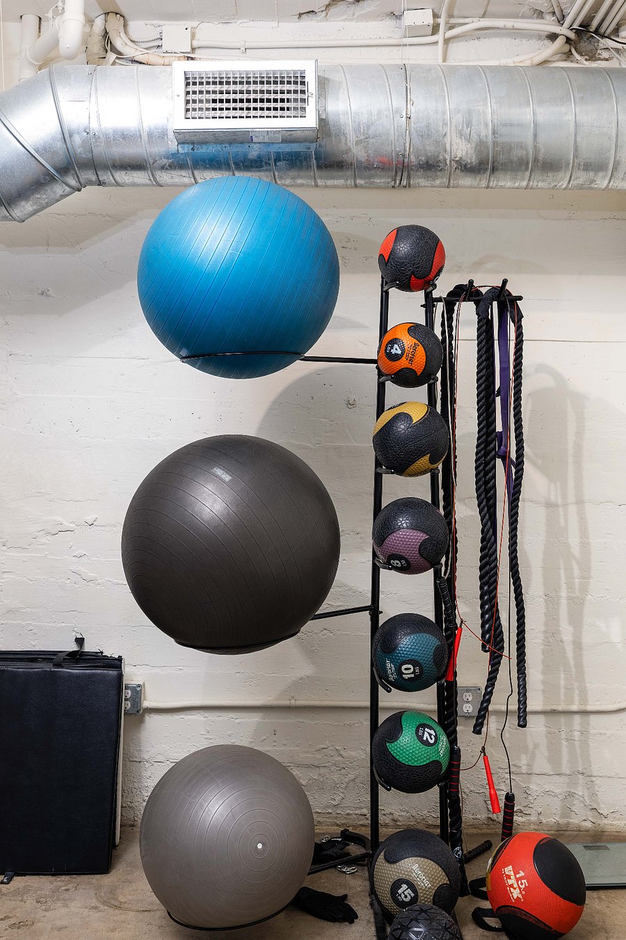 Gym equipment located in basement
