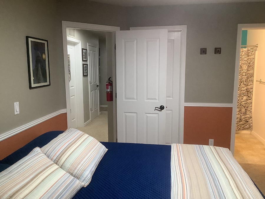 Hall to the room. Private-use laundry room is just to the left.