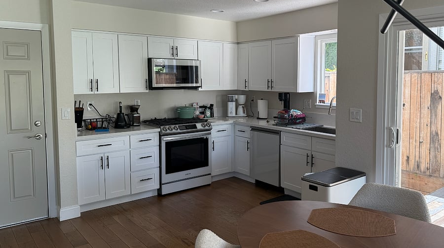 Kitchen, dining, and laundry.