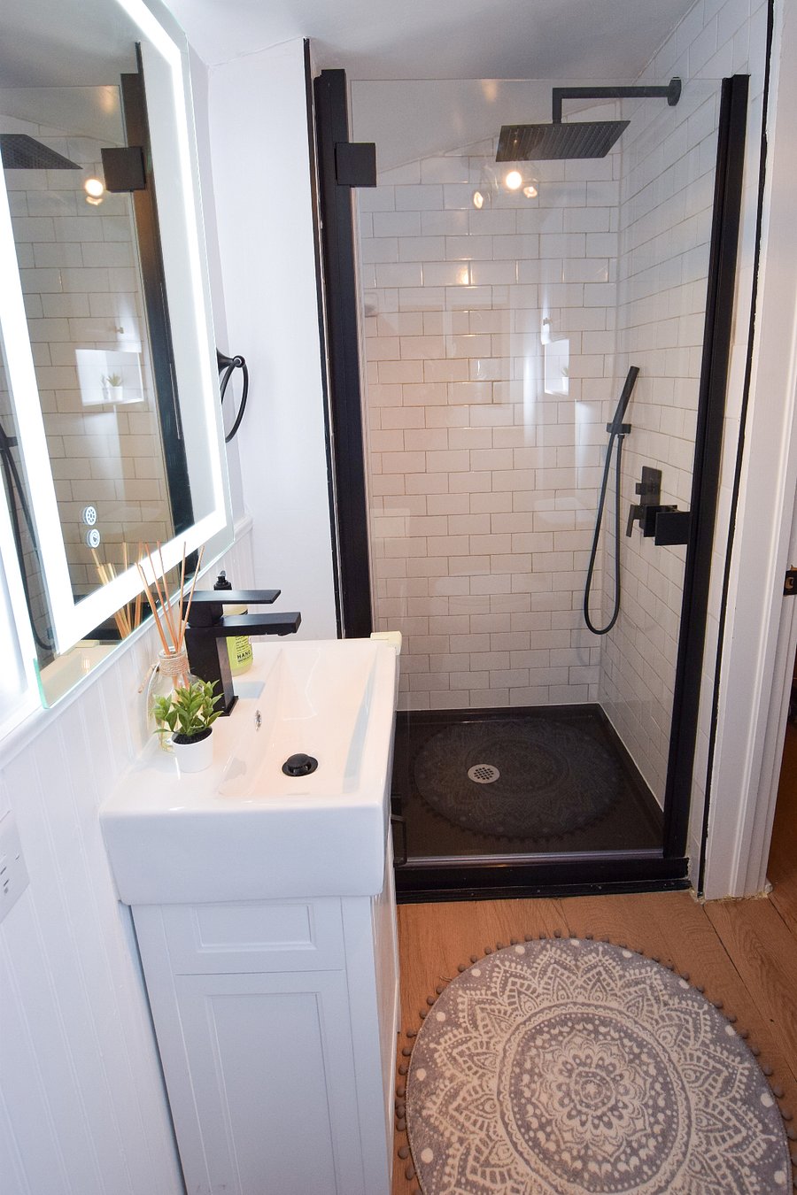 Completely remodeled bathroom, everything is new. Rain head in the shower.