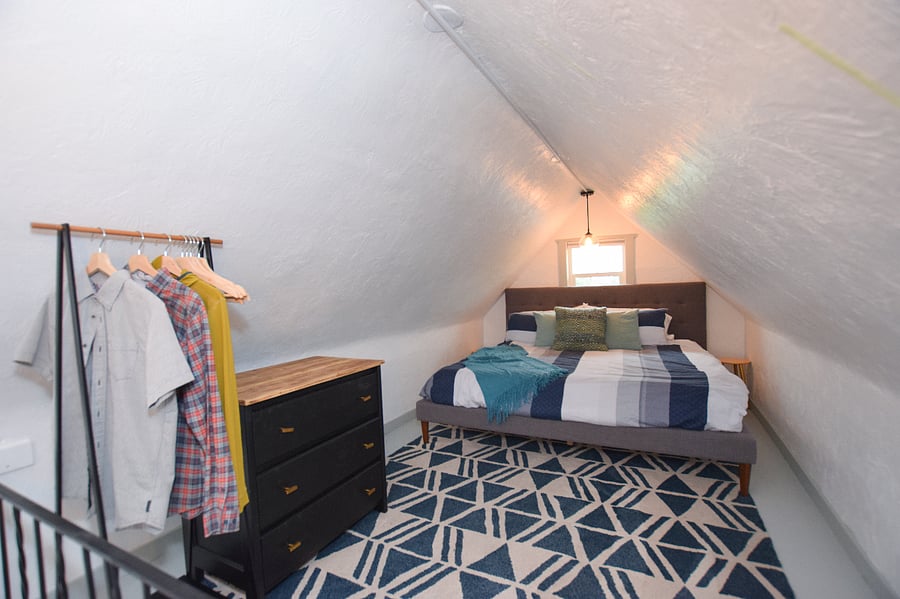 King sized comfy bed in bedroom