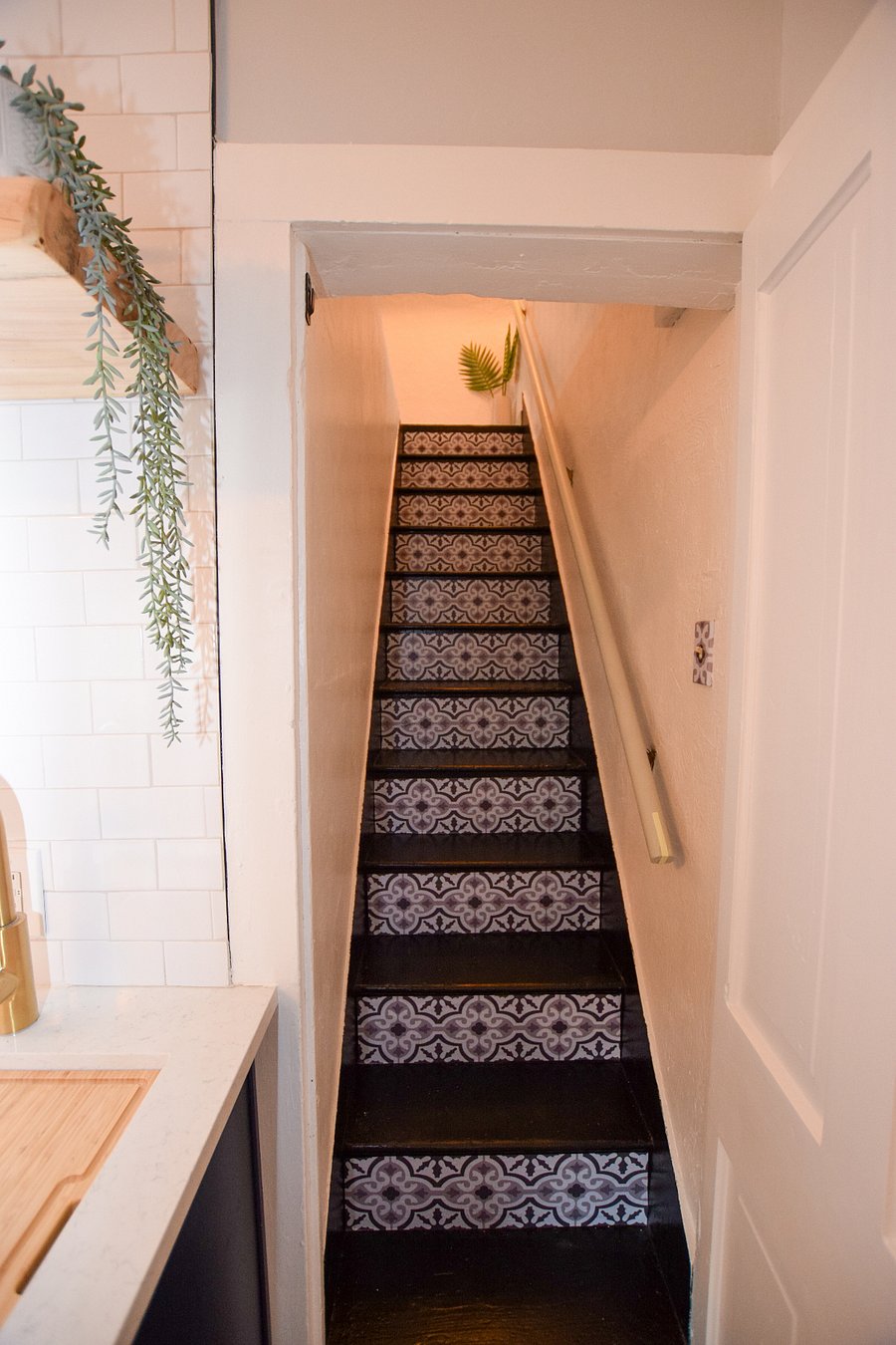 Stairs from kitchen to bedroom