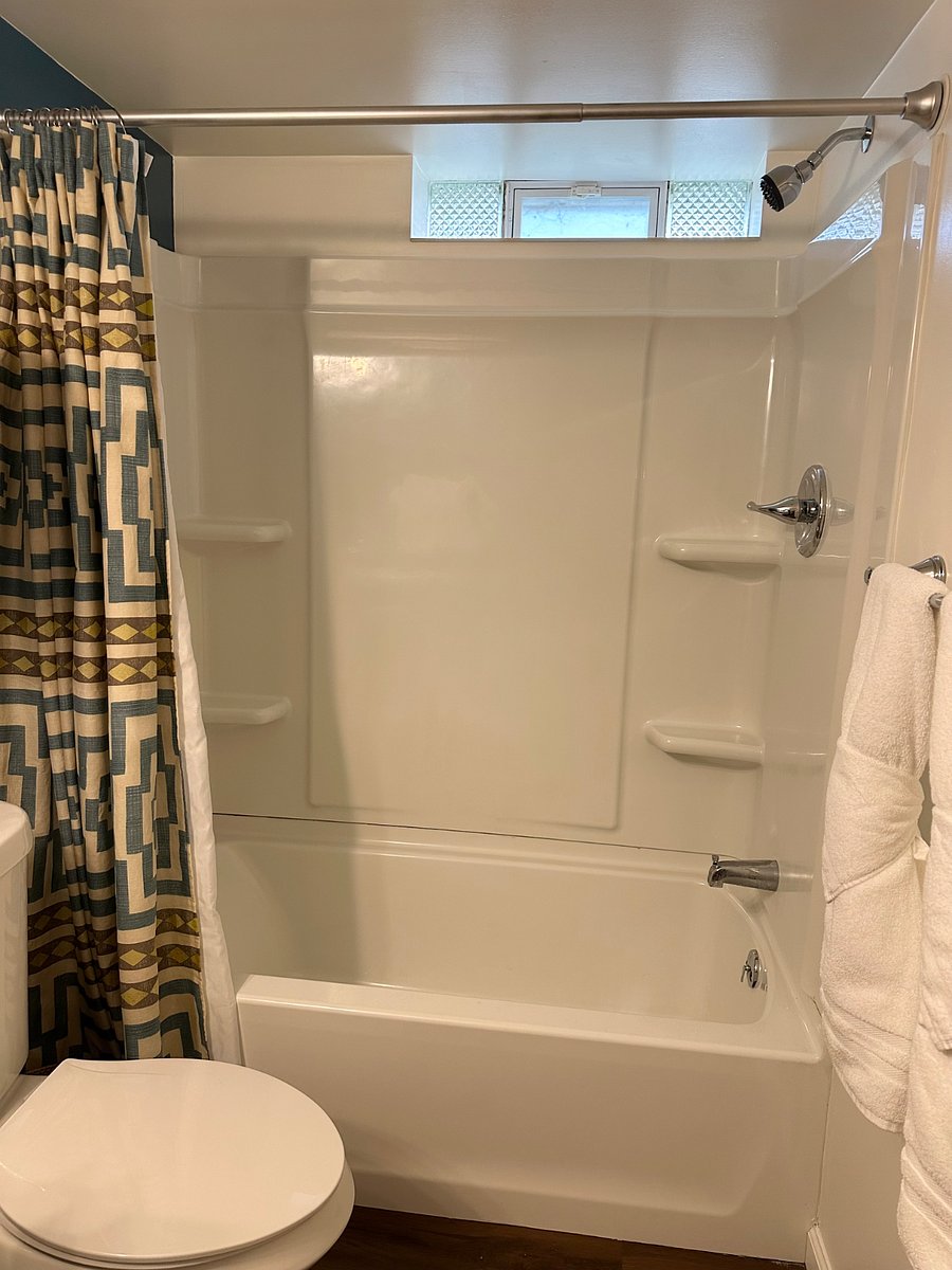 Full bathtub and shower.
