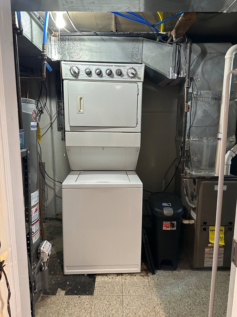 Your own in-unit laundry with clothes rack.