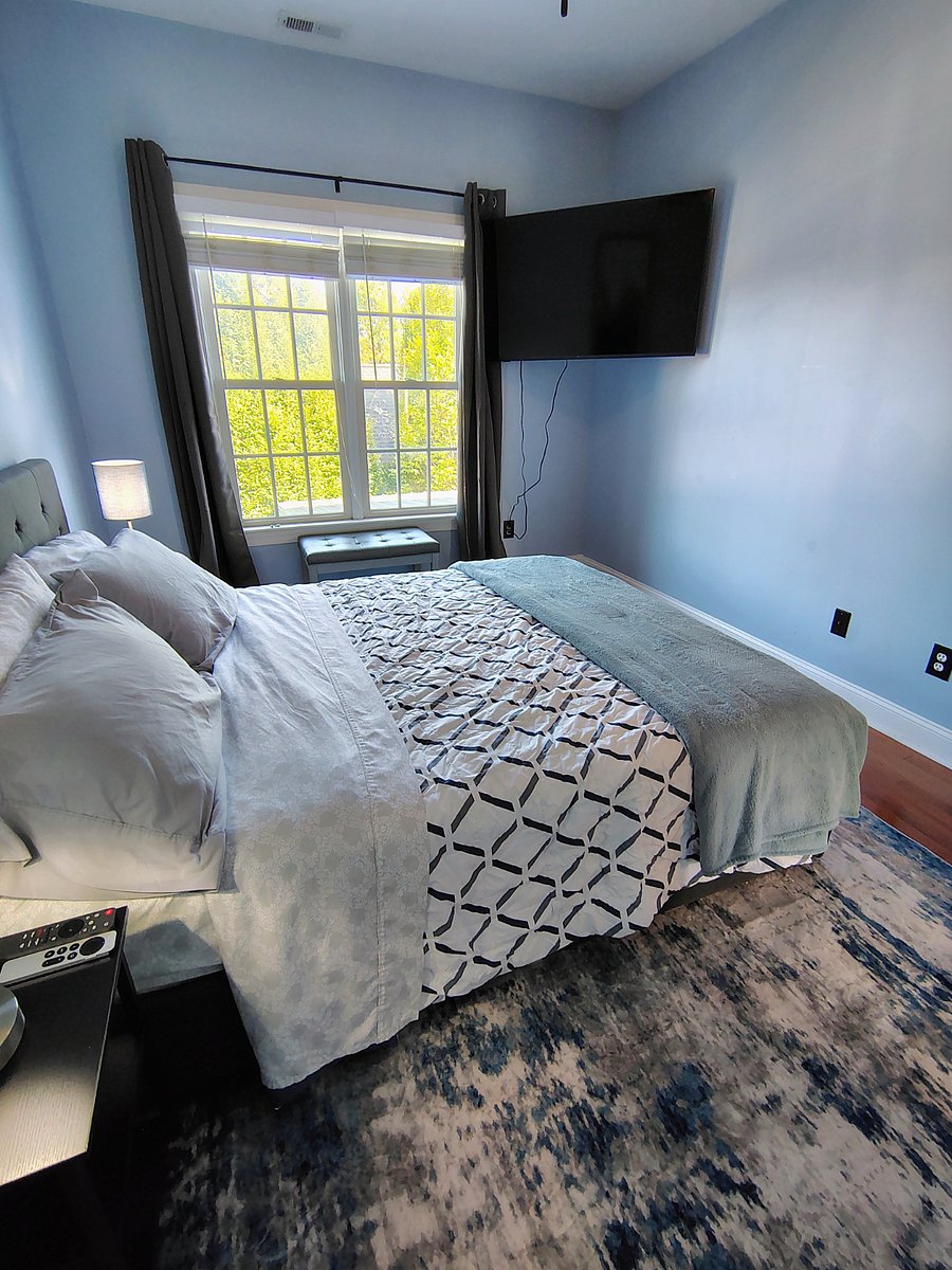 PRIVATE BEDROOM--queen bed and large 55 inch flat screen smart tv and ceiling fan
