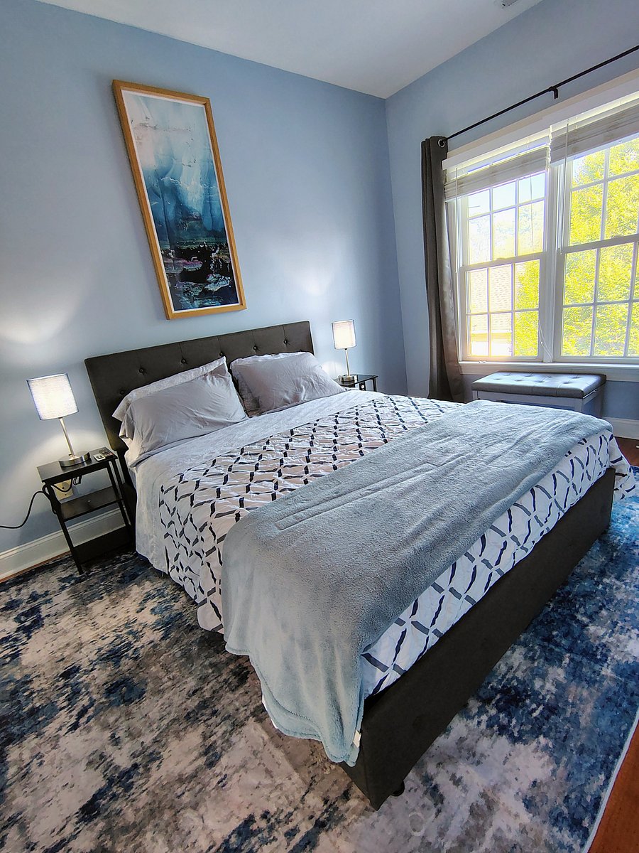 PRIVATE BEDROOM--peaceful courtyard side view, black out curtains can be drawn to make the room dark