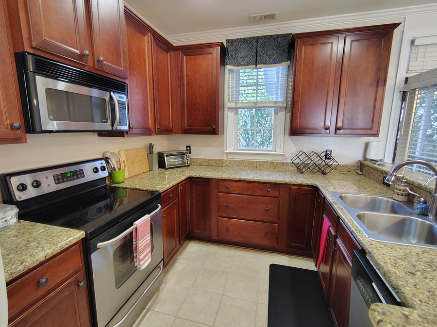 microwave, dishwasher, stove, toaster/airfryer oven, and K-cup coffee maker