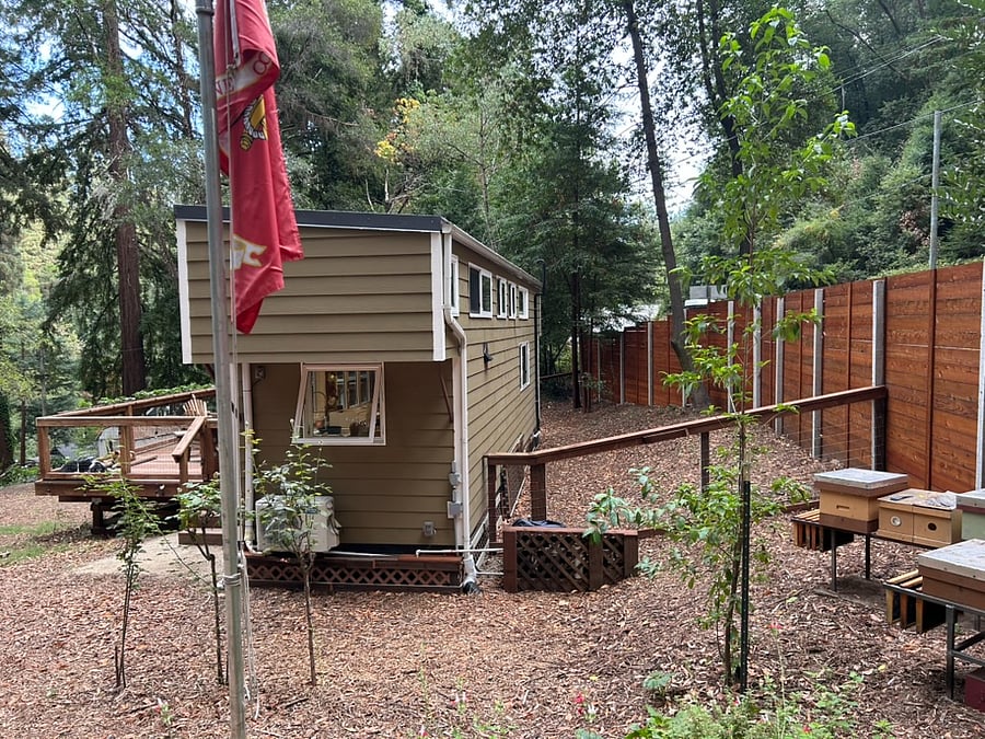 The private yard wraps behind the house as well.