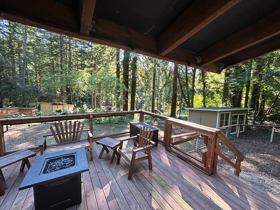 Enjoy the gas fire pit and deck furniture on your private deck.