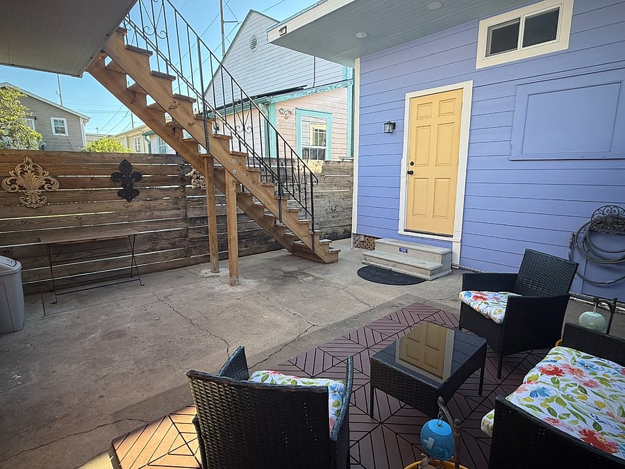 Shared backyard with the studio apartment above shed. 