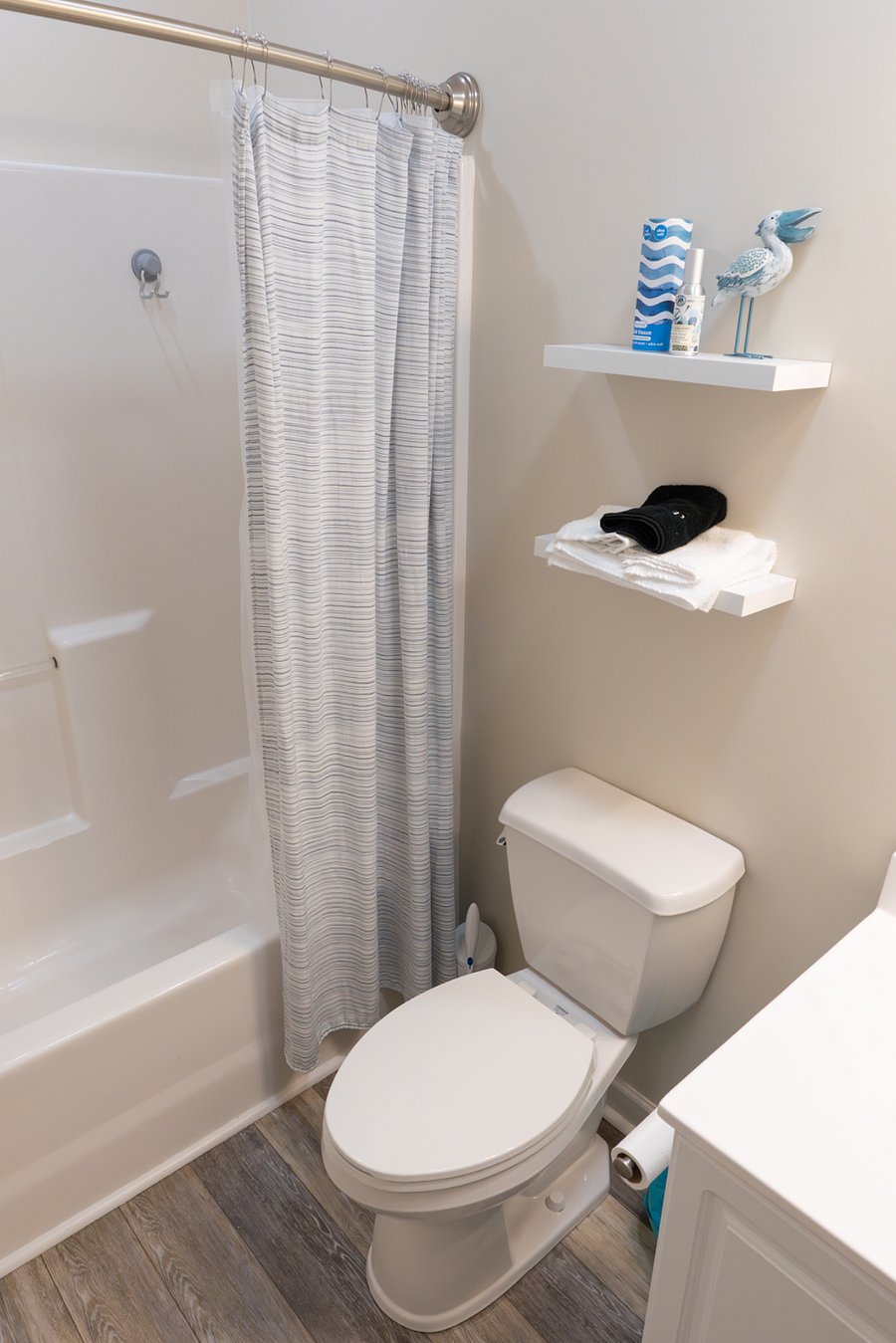 second bathroom in hall by second bedroom
