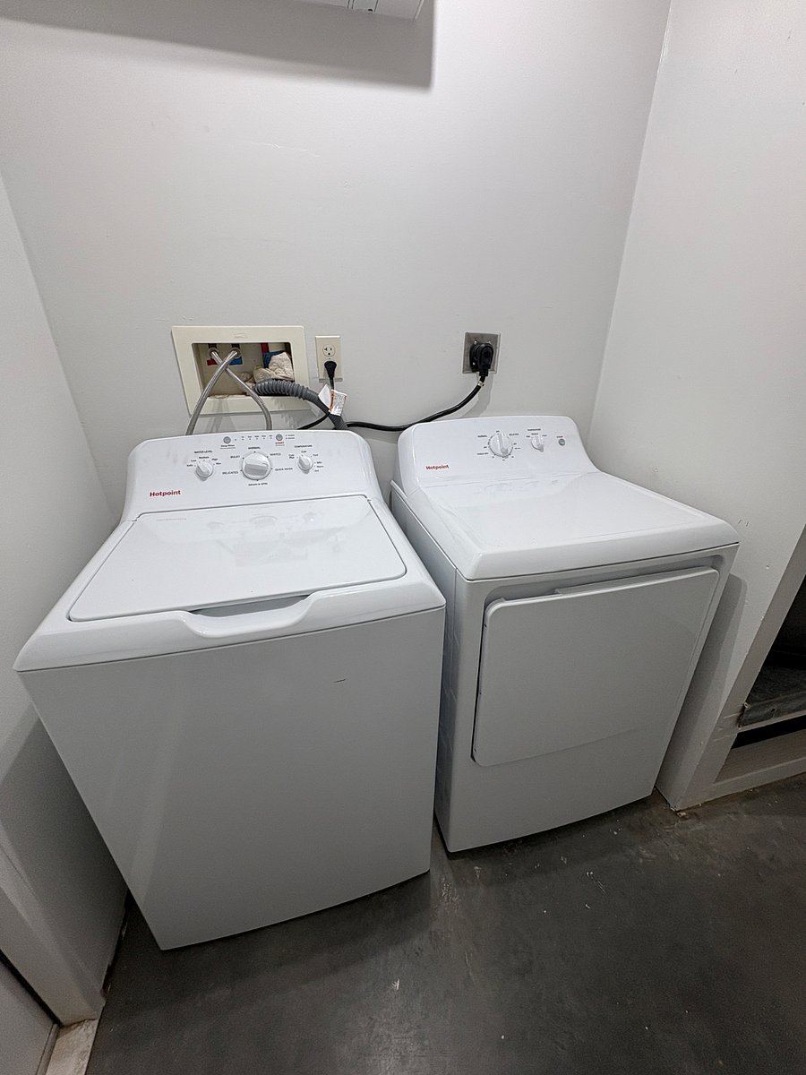 Full Laundry room with storage.  