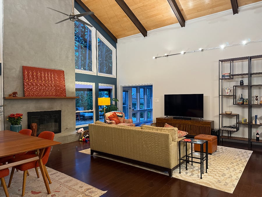 Huge TV. Entrance to the sunroom