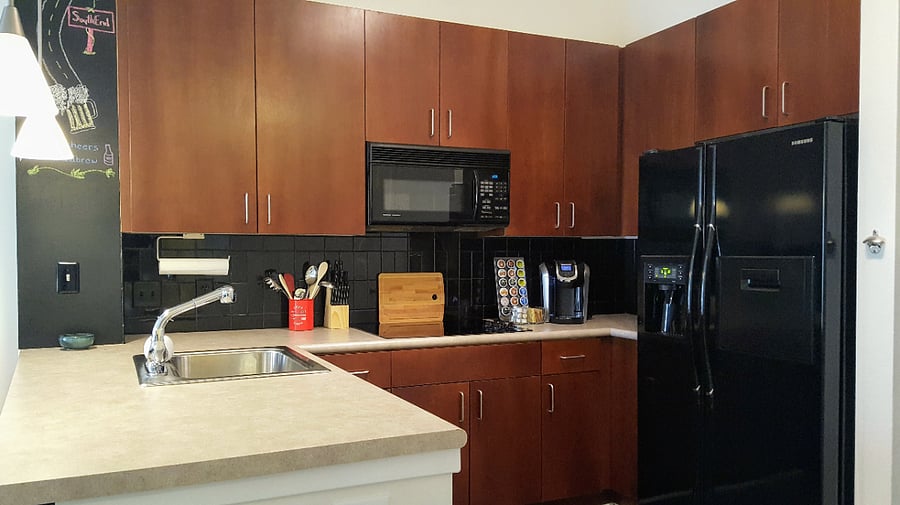 Fully stocked kitchen. Keurig with coffee pods, creamer, and sugar
