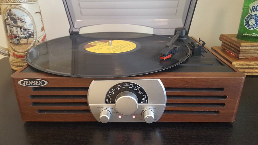 For the vinyl fans! Record player with a selection of records from various genres.