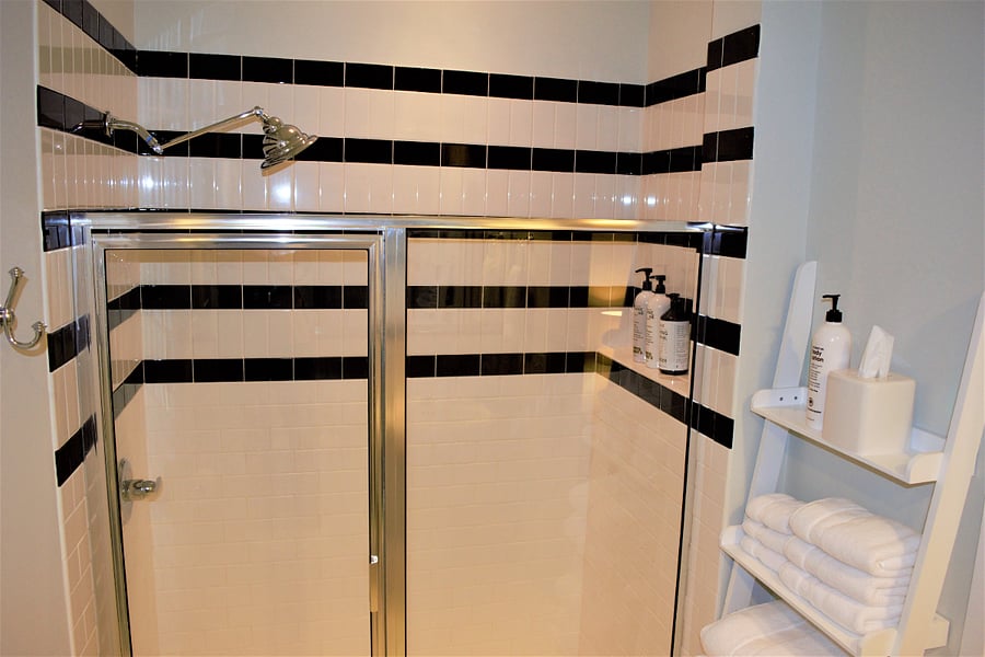 Spacious bathroom with walk-in shower.