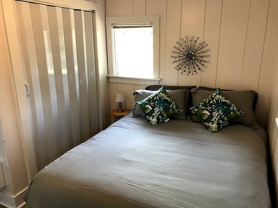 Queen size bed in bedroom